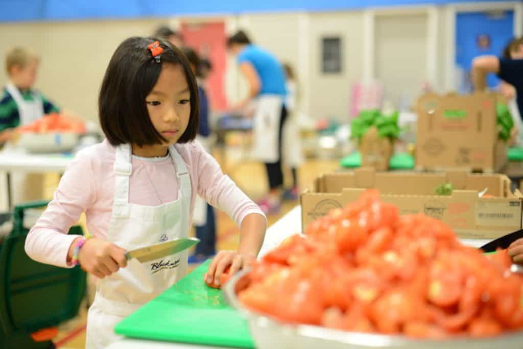 Children cooking healthy food